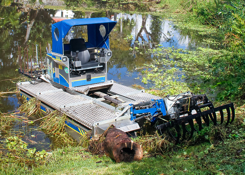 working with the Truxor machine - lake management services fort myers, cape coral